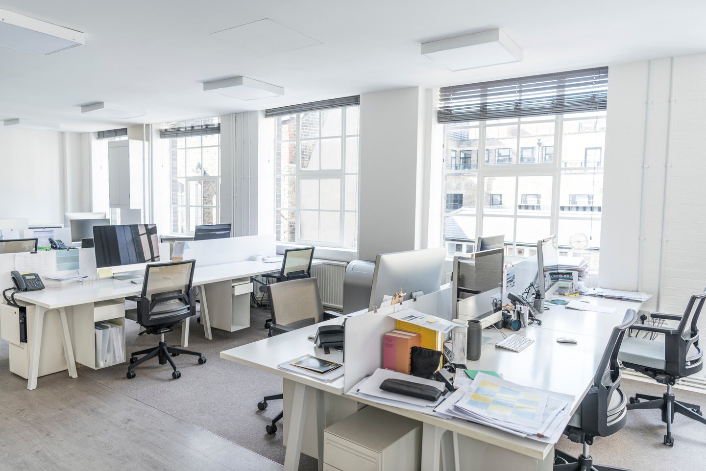 Tidy desks in contemporary office with natural light